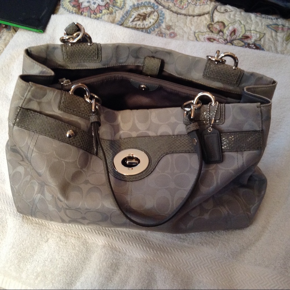 Coach silver purse,large front pocket, (T)